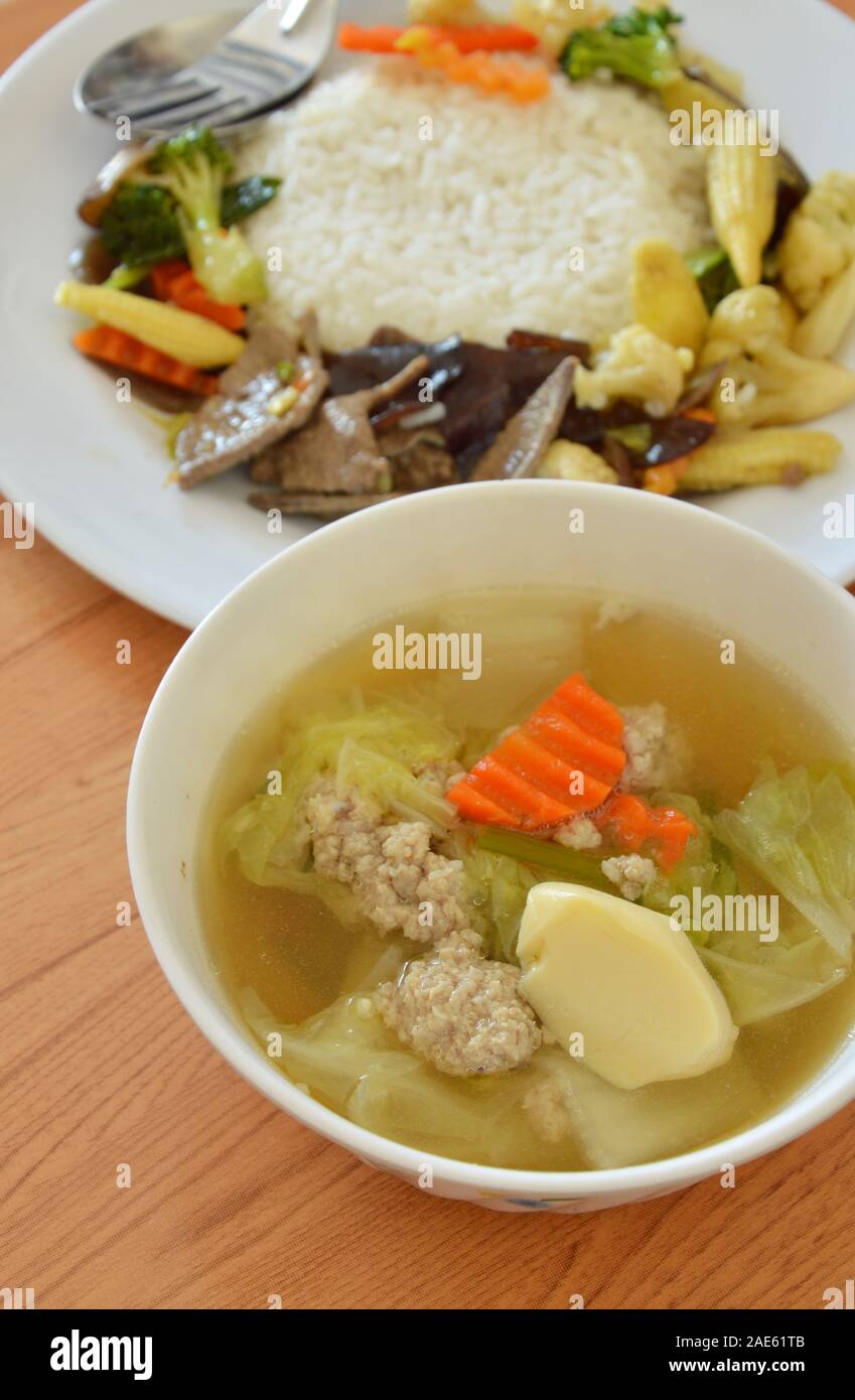 egg tofu soup and stir fried vegetable with pork liver on rice Stock Photo