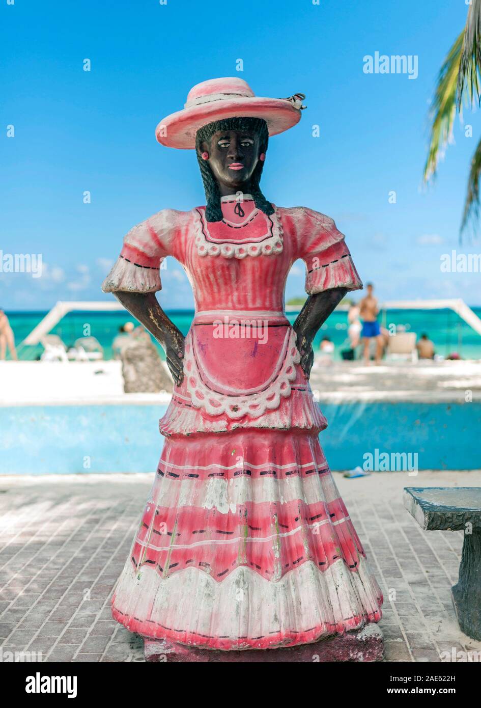 Figurine of a woman on the seafront promenade on the island of San Andres, Colombia. Stock Photo