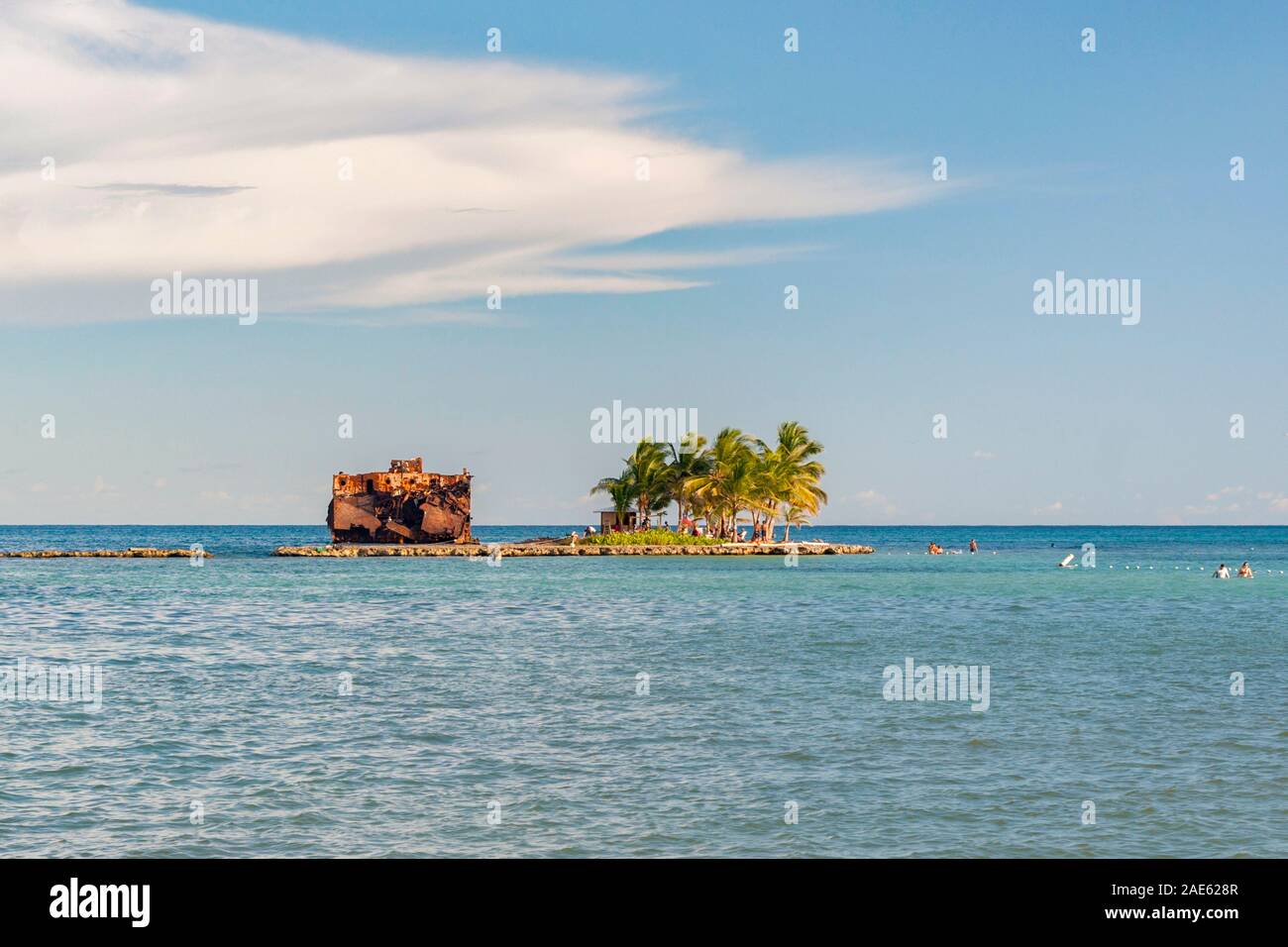 Islet and shipwreck off San Luis on the coast of the island of San Andres, Colombia. Stock Photo