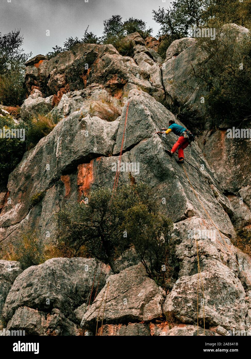 cave mountains climb escalade hiking man women Stock Photo