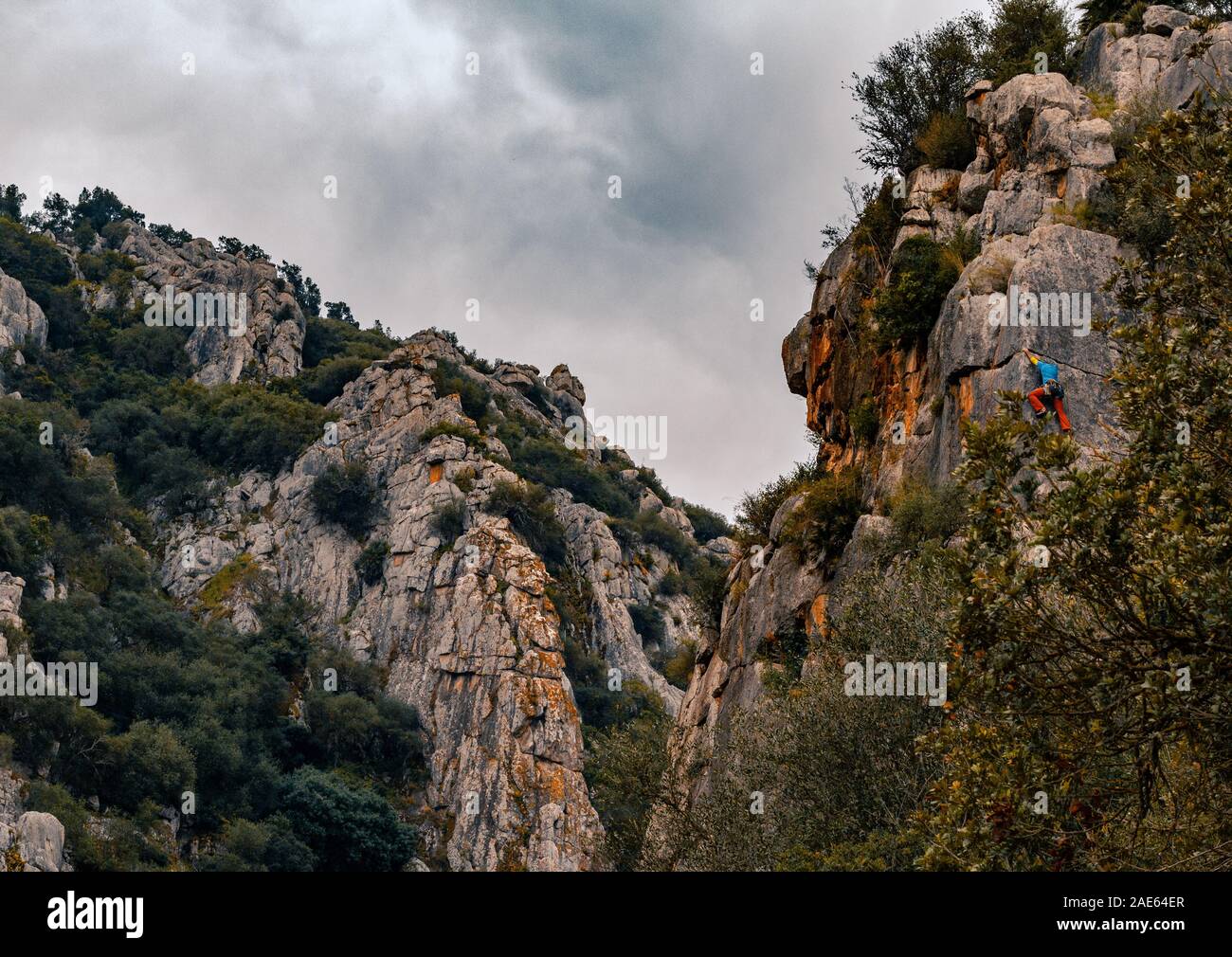 cave mountains climb escalade hiking man women Stock Photo