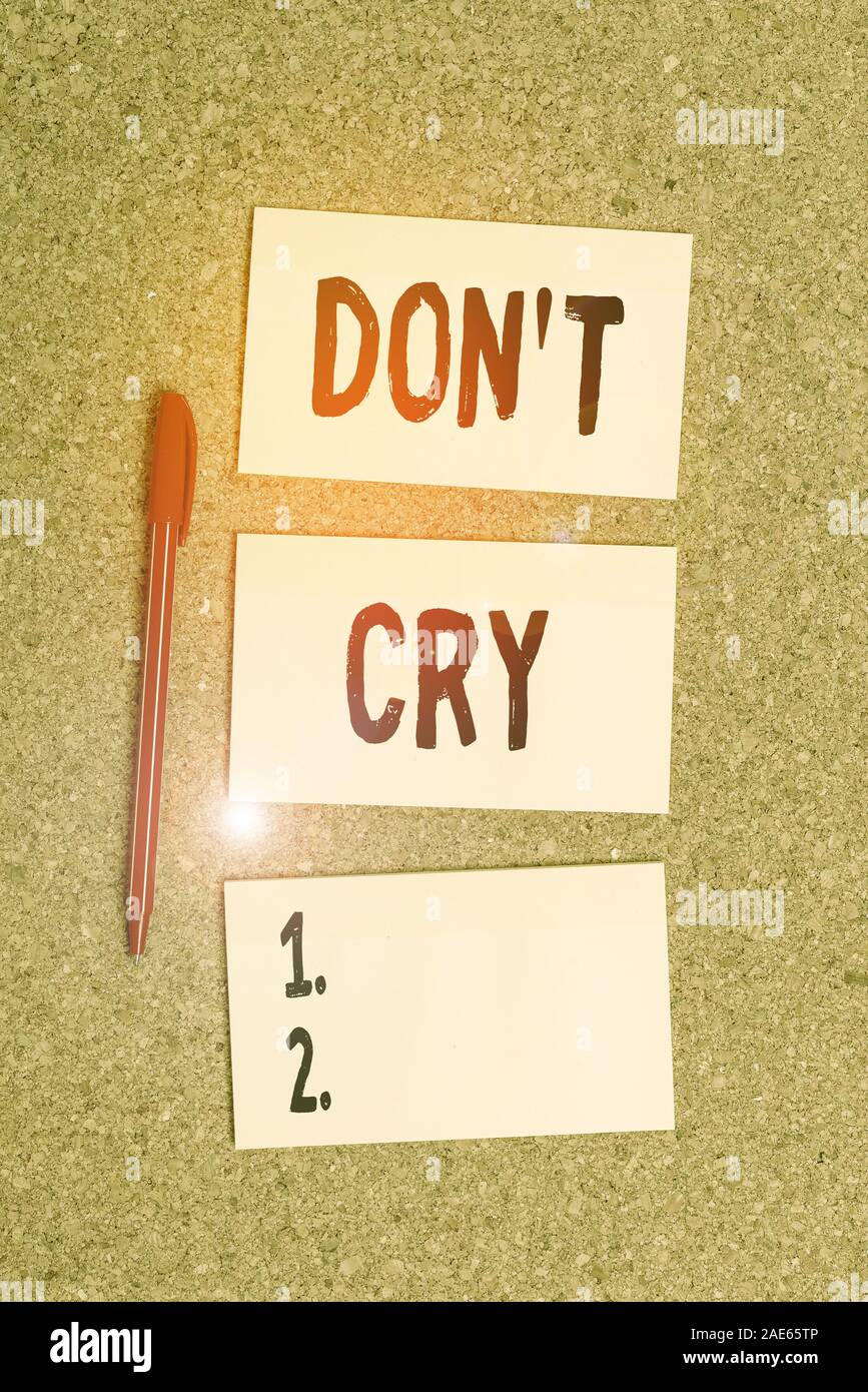 Conceptual hand writing showing Don T Cry. Concept meaning Shed tears  typically as an expression of distress pain or sorrow Empty sticker  reminder mem Stock Photo - Alamy