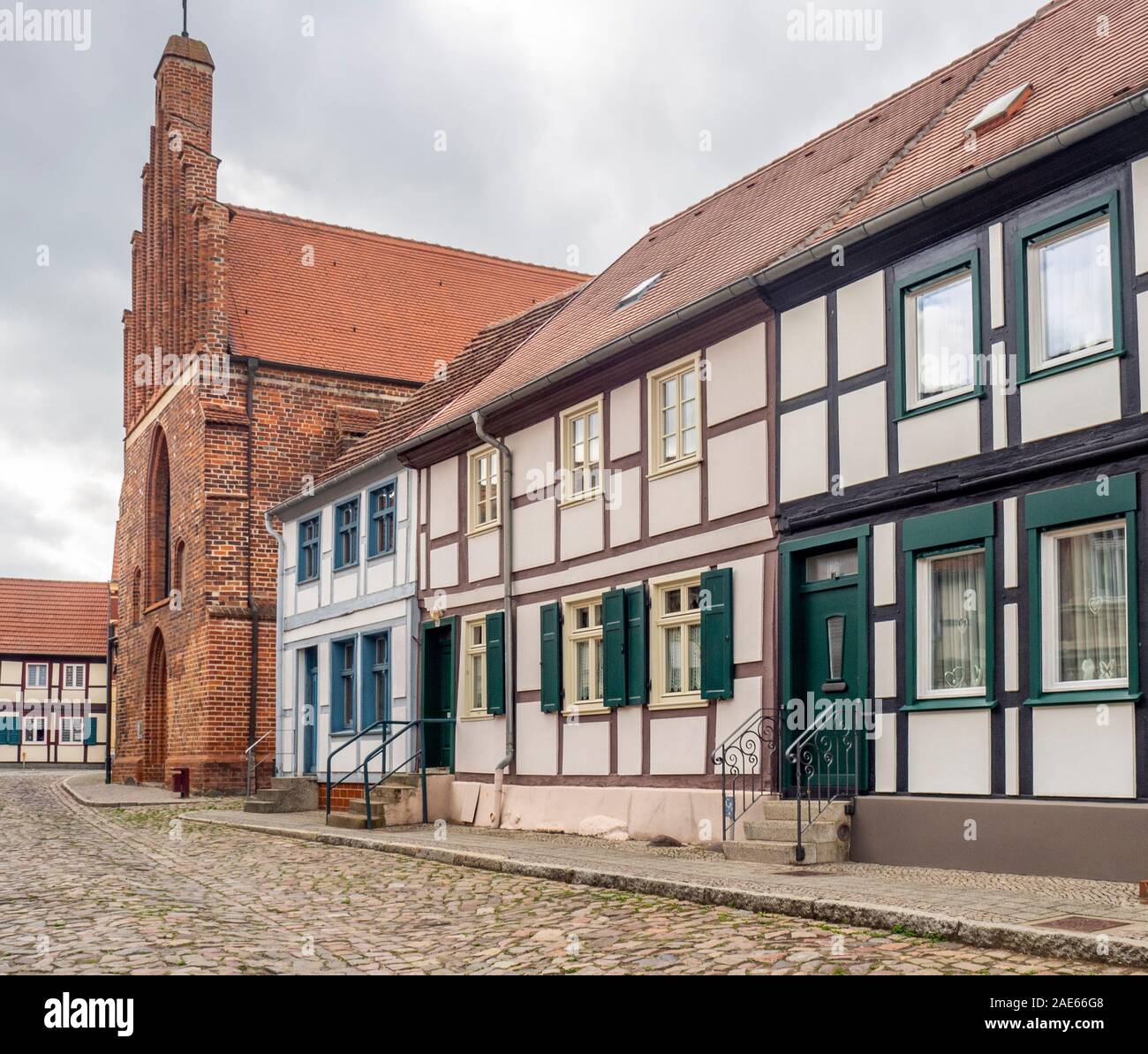 Saint Elizabeth church and Traditional timber frame buildings in historic Altstadt Tangermünde Saxony-Anhalt Germany. Stock Photo