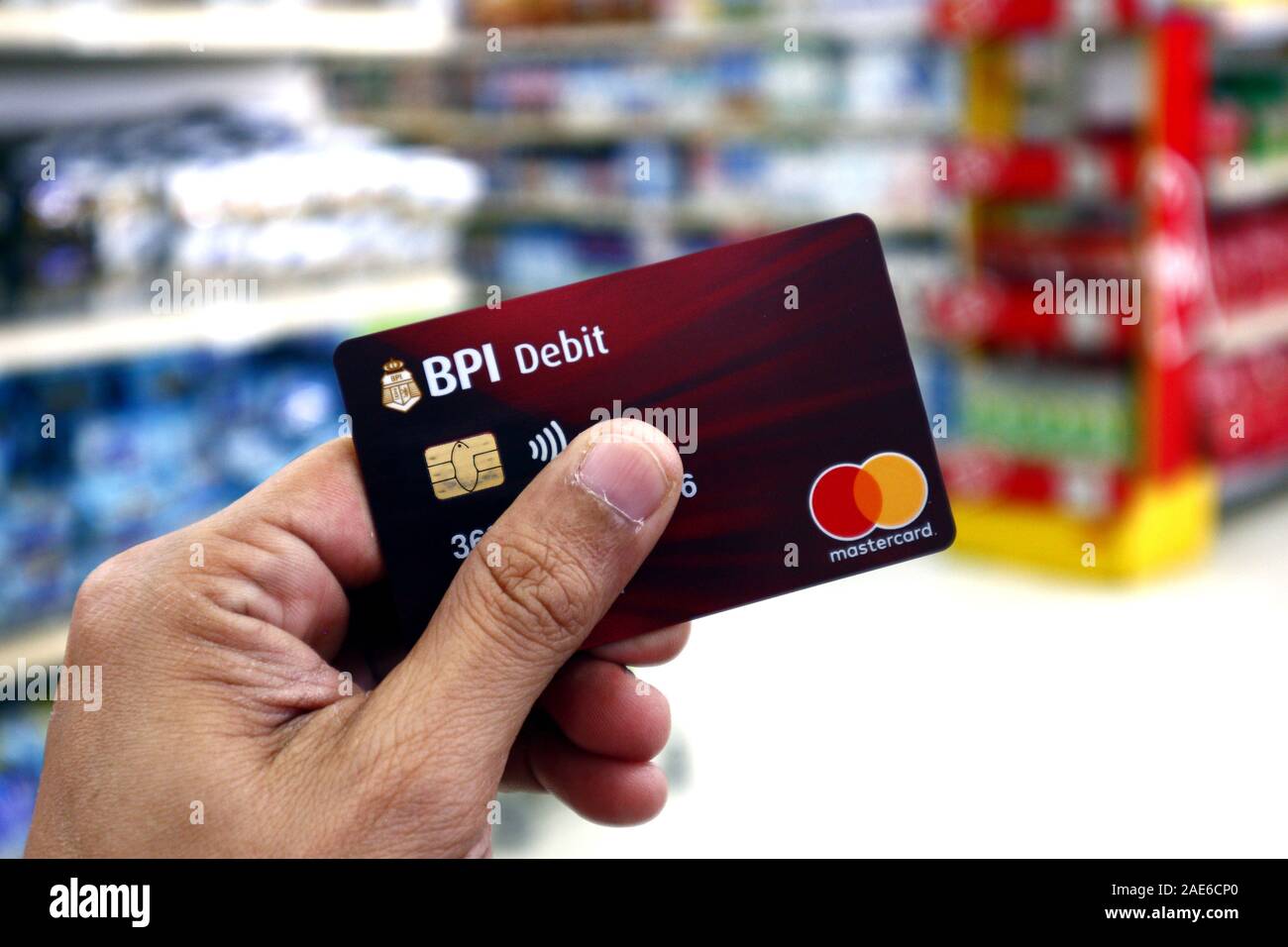 Antipolo City Philippines December 4 2019 Hand Holding A Bank Debit And Atm Card While Inside A Supermarket Stock Photo Alamy