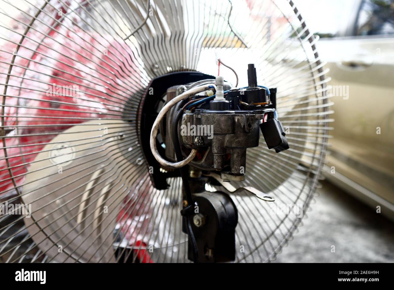 Photo of an uncovered motor of an electric fan Stock Photo