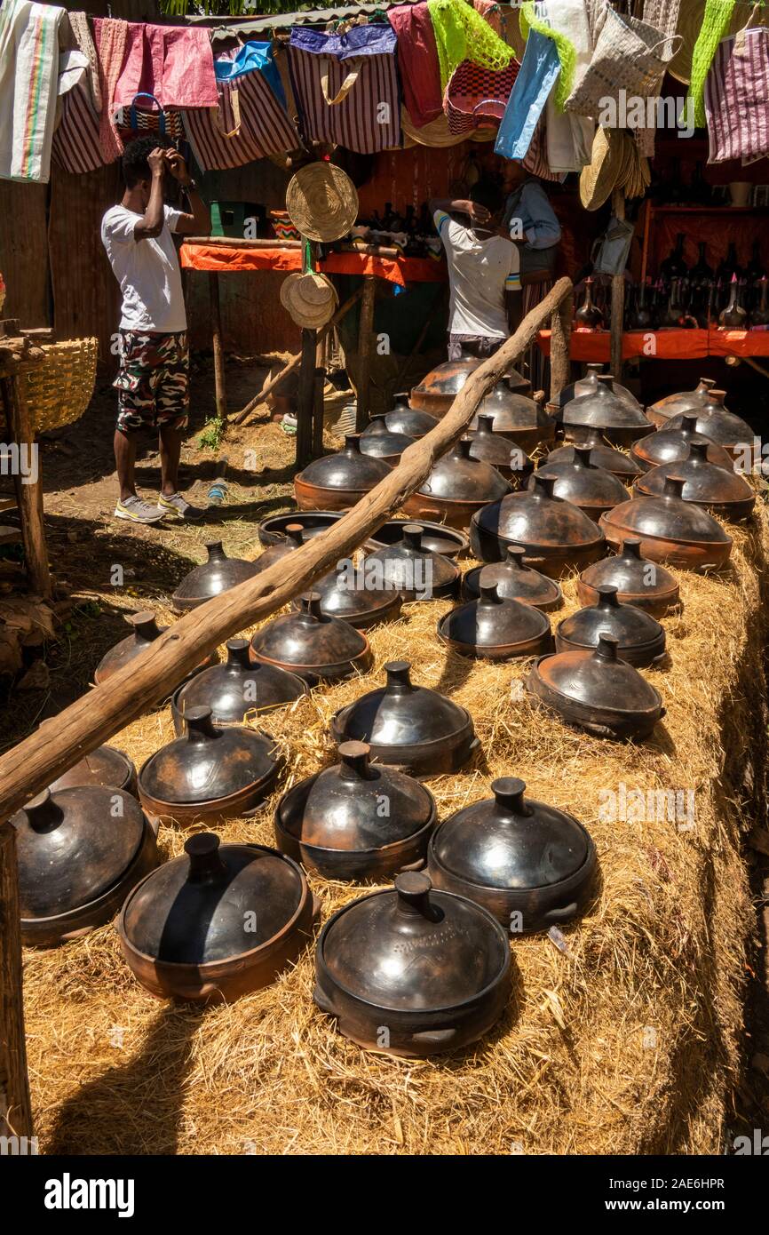 Eth553Ethiopia, Amhara Region, Gondar, Arada Market, ceramic cooking pots displayed on straw Stock Photo