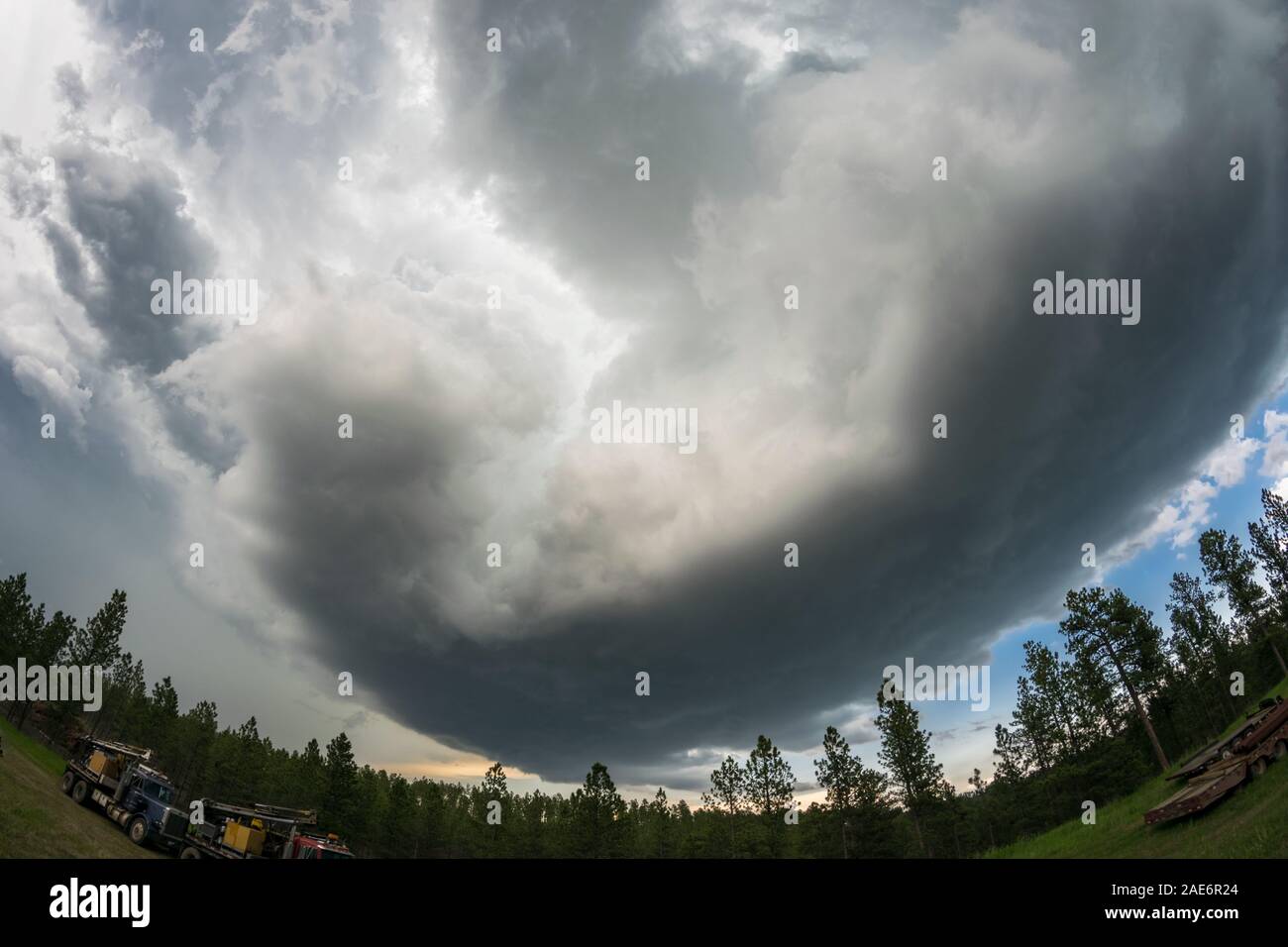 Rotating clouds of a mesocyclone of a supercell thunderstorm over the Black Hills, just southwest of Rapid City in South Dakota Stock Photo