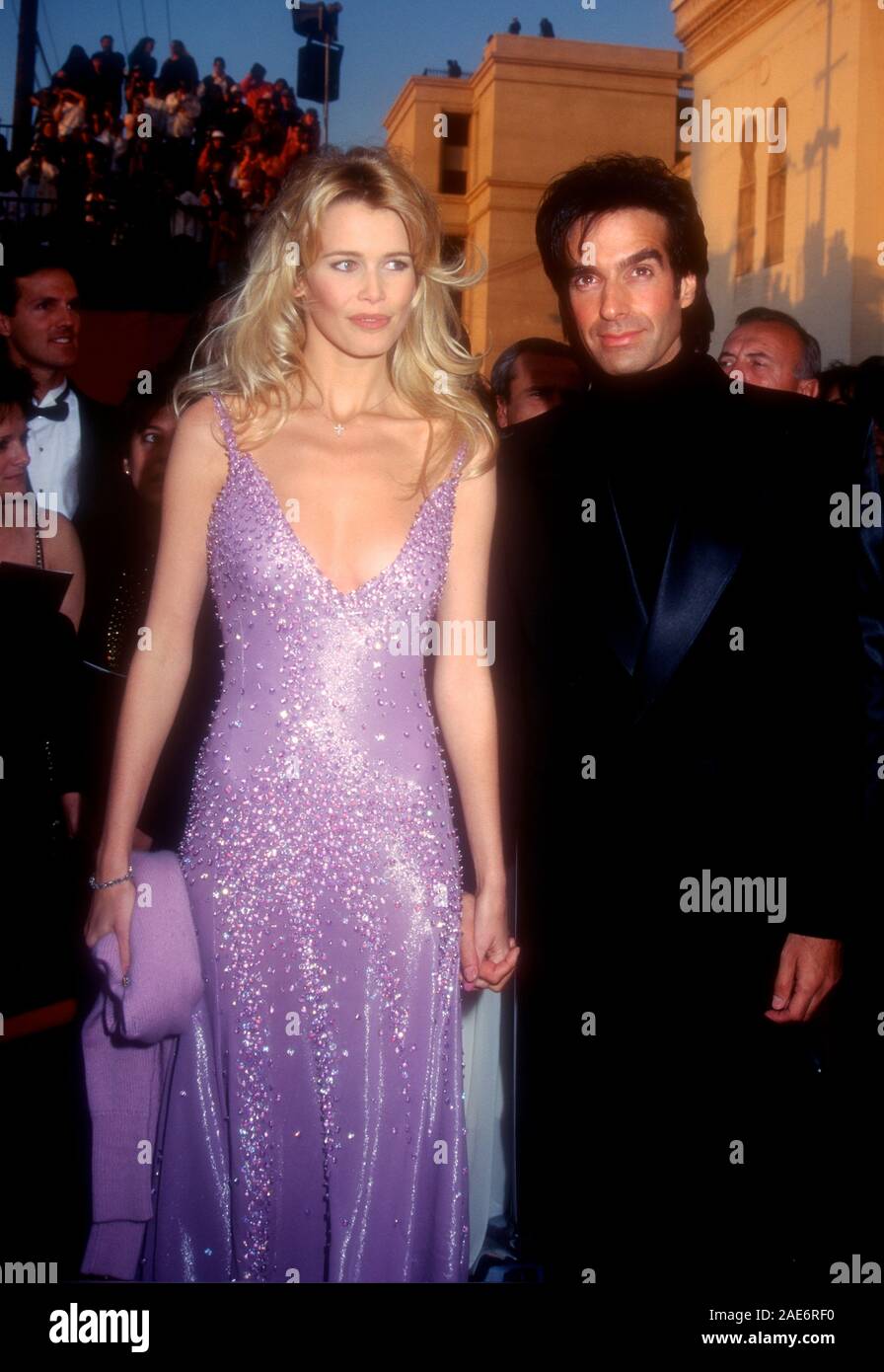 Los Angeles, California, USA 27th March 1995 Model Claudia Schiffer and magician David Copperfield attend the 67th Annual Academy Awards on March 27, 1995 at the Shrine Auditorium in Los Angeles, California, USA. Photo by Barry King/Alamy Stock Photo Stock Photo