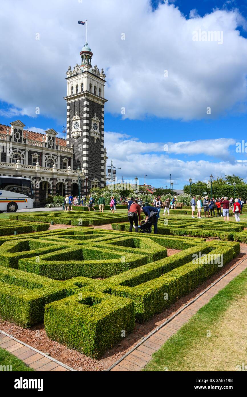 Dunedin railway station (1906) was designed by George Troup.  Anzac Square, Dunedin, New Zealand. Stock Photo
