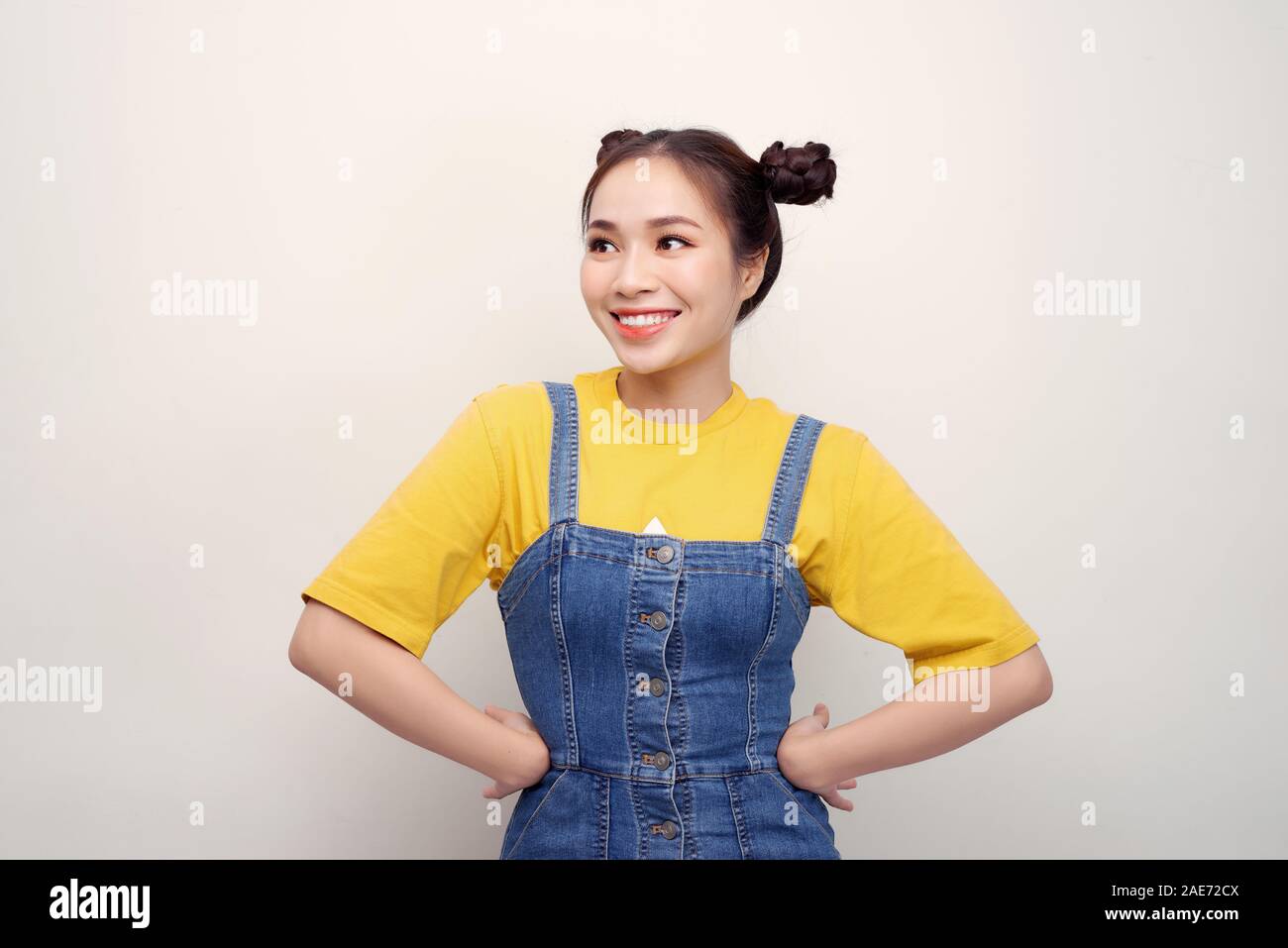 Cute asian woman bun hair hi-res stock photography and images - Alamy