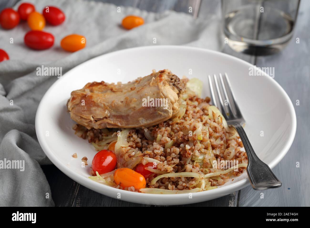 Roasted rabbit with buckwheat porridge, roasted onions and cherry ...