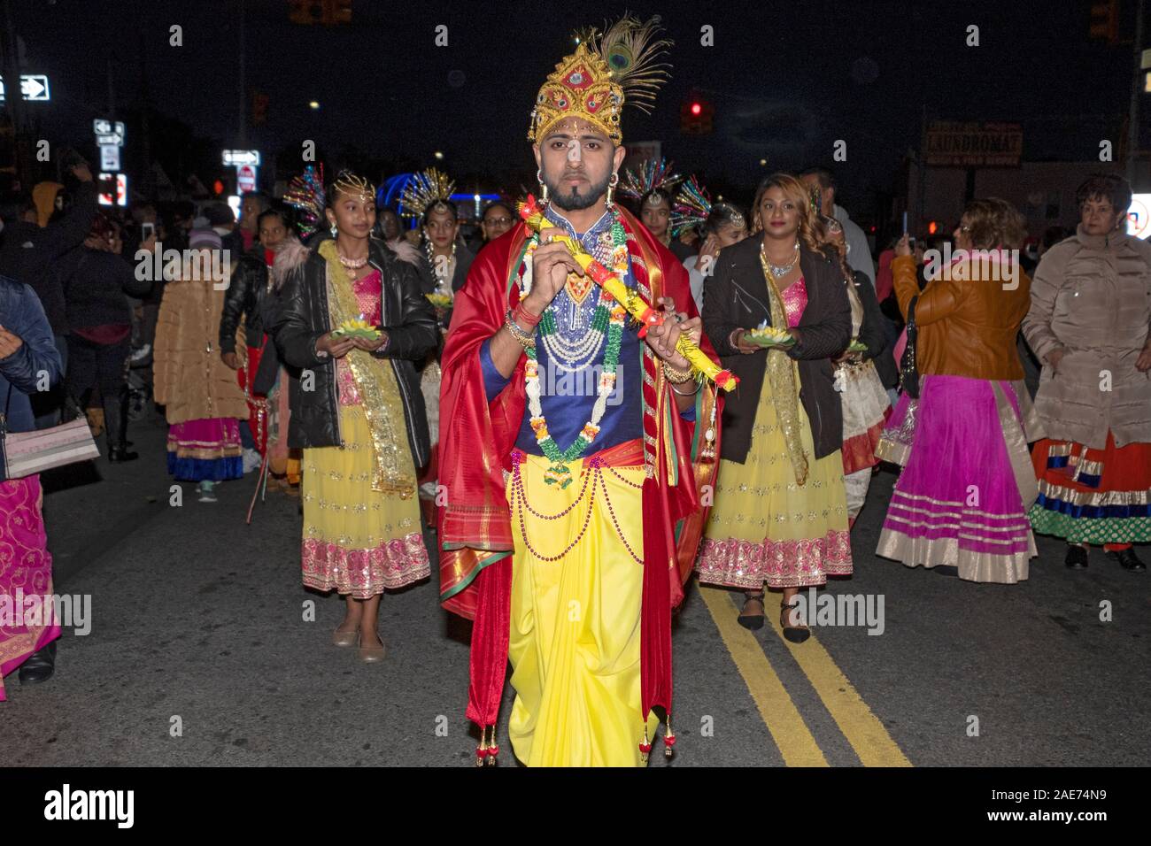 Marchers in colorful costumes in the Diwali Parade on Liberty Avenue in Queens, New York. Stock Photo