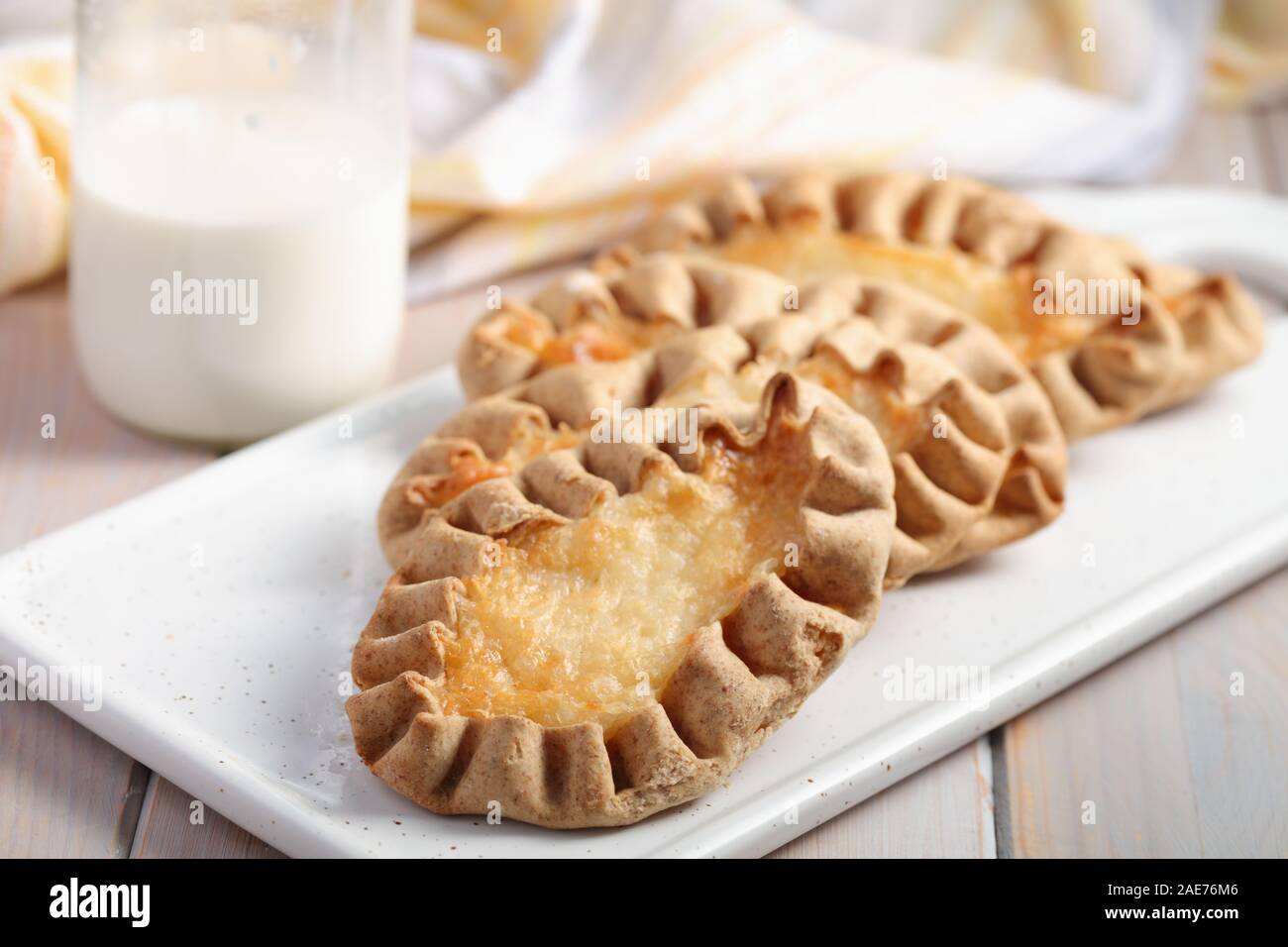 Karjalanpiirakat, Karelian pasties on a cutting board. Today it is a national dish in Finland Stock Photo