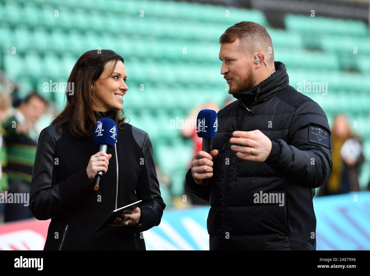 Channel 4 Presenter Lee McKenzie with former Northampton Saints and England player Dylan Hartley before the Heineken European Champions Cup pool one match between Northampton Saints and Leinster at Franklins Gardens, Northampton. Stock Photo