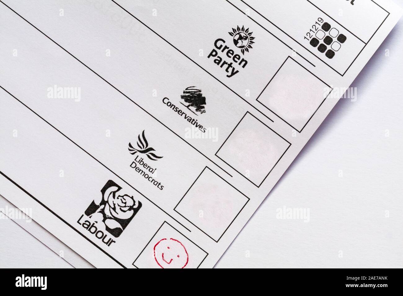 Spoiled spoilt ballot paper for forthcoming Parliamentary Election 2019 in UK - wasted vote smiley face emoji against labour Stock Photo