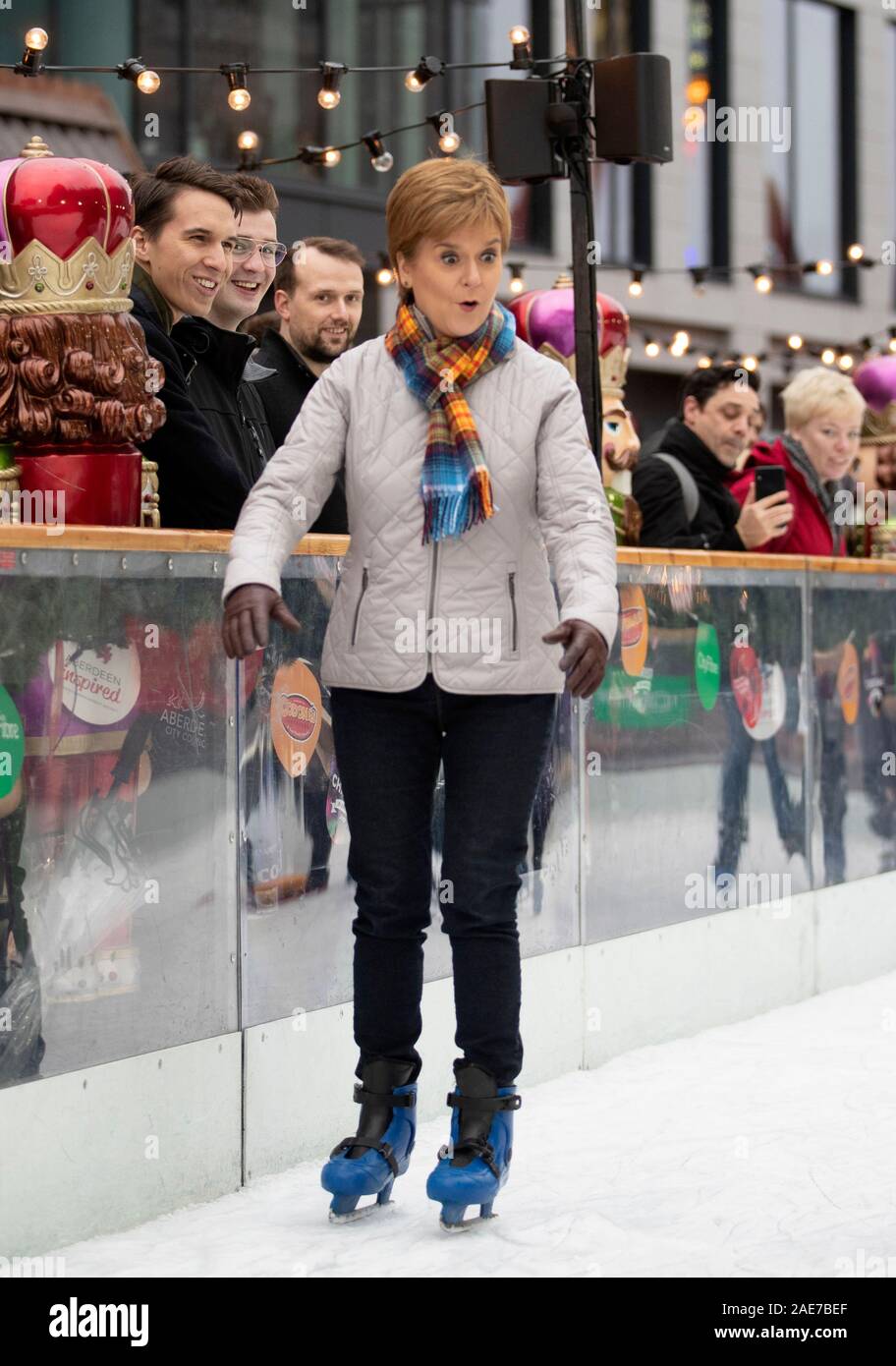 SNP leader Nicola Sturgeon ice skates during a visit to the Aberdeen Christmas Market in The Quad, Marischal College, on the General Election campaign trail. Stock Photo