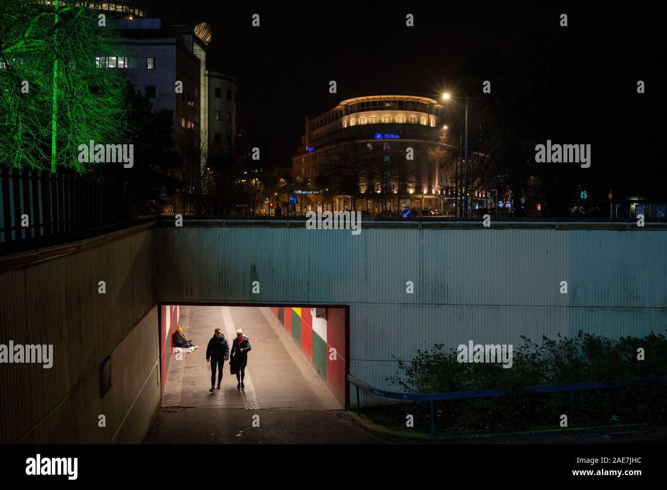 Two sides to a city. Homelessness alongside affluence, a common site in most UK cities these days. Stock Photo