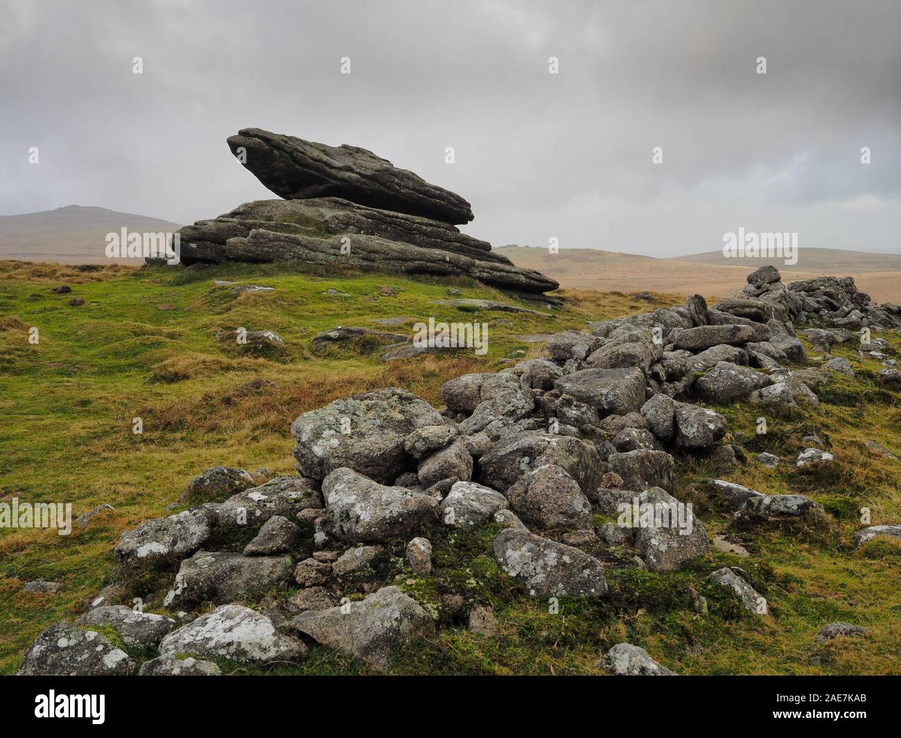 Rabbit Rock and Irishman's Wall next to Belstone Tor set under a grey sky, Dartmoor National Park, Devon Stock Photo
