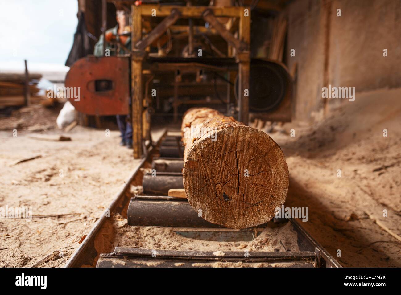 Log on woodworking machine, nobody, sawmill Stock Photo