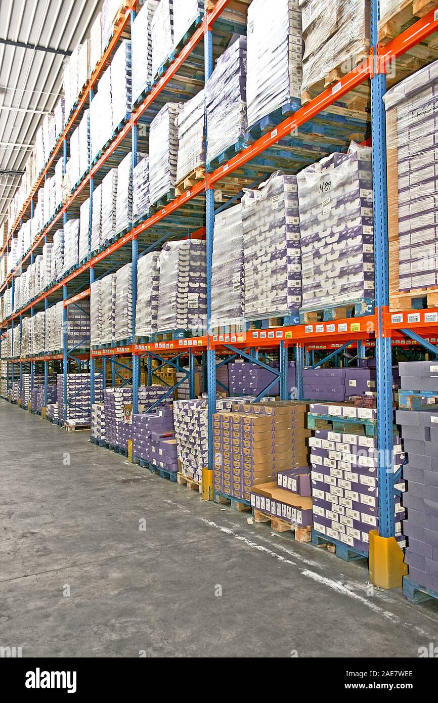 large storage room with shelves Stock Photo