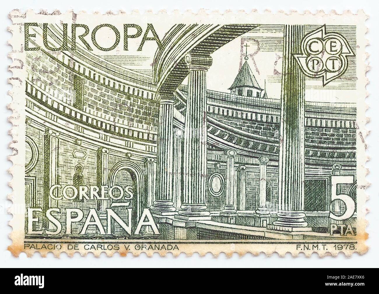 MERIDA, EXTREMADURA, SPAIN - DIC, 01, 2018 -  stamp printed in Spain shows the palace of king Carlos V, in Granada. CIRCA: 1.978 Stock Photo