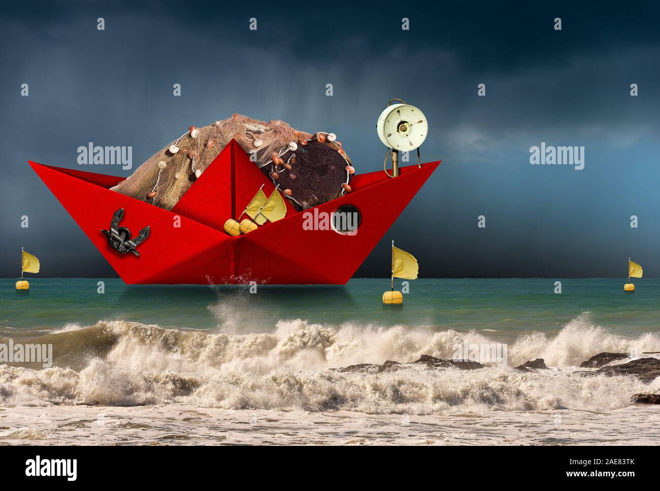 Red paper fishing boat with fishing nets, buoys with flags, winch and
