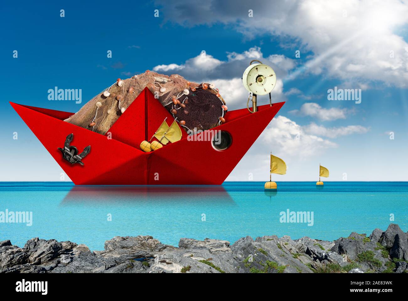 Red paper fishing boat with fishing nets, buoys with flags, winch and
