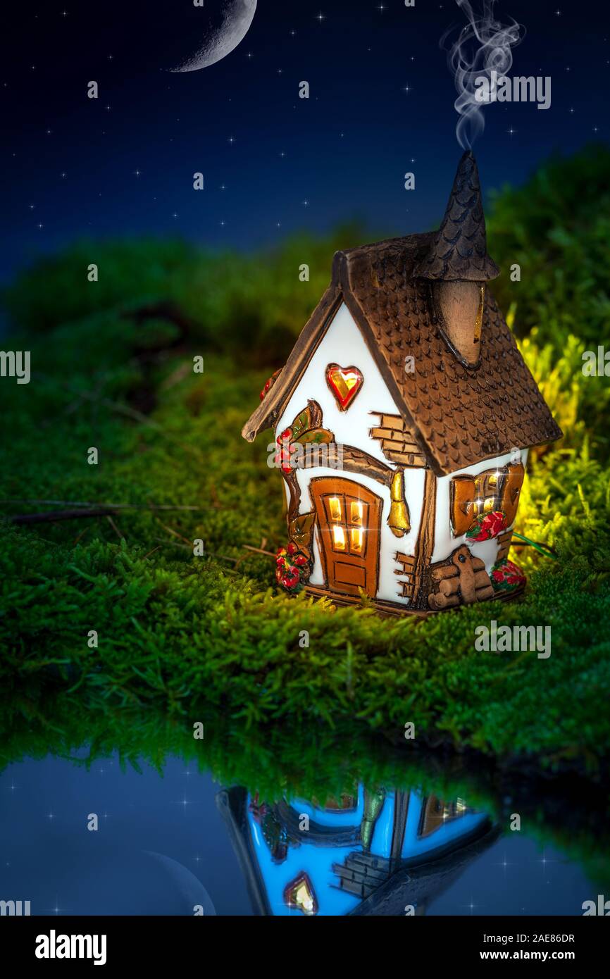 composition with small house of fairy tales Stock Photo Alamy