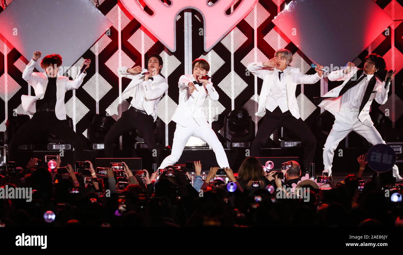 INGLEWOOD, LOS ANGELES, CALIFORNIA, USA - DECEMBER 06: J-Hope (Jung Ho-seok), Jimin (Park Ji-min), Jin (Kim Seok-jin), Jungkook (Jeon Jung-kook), RM (Kim Nam-joon), Suga (Min Yoon-gi), V (Kim Tae-hyung) of BTS perform at 102.7 KIIS FM's Jingle Ball 2019 held at The Forum on December 6, 2019 in Inglewood, Los Angeles, California, United States. (Photo by Xavier Collin/Image Press Agency) Stock Photo