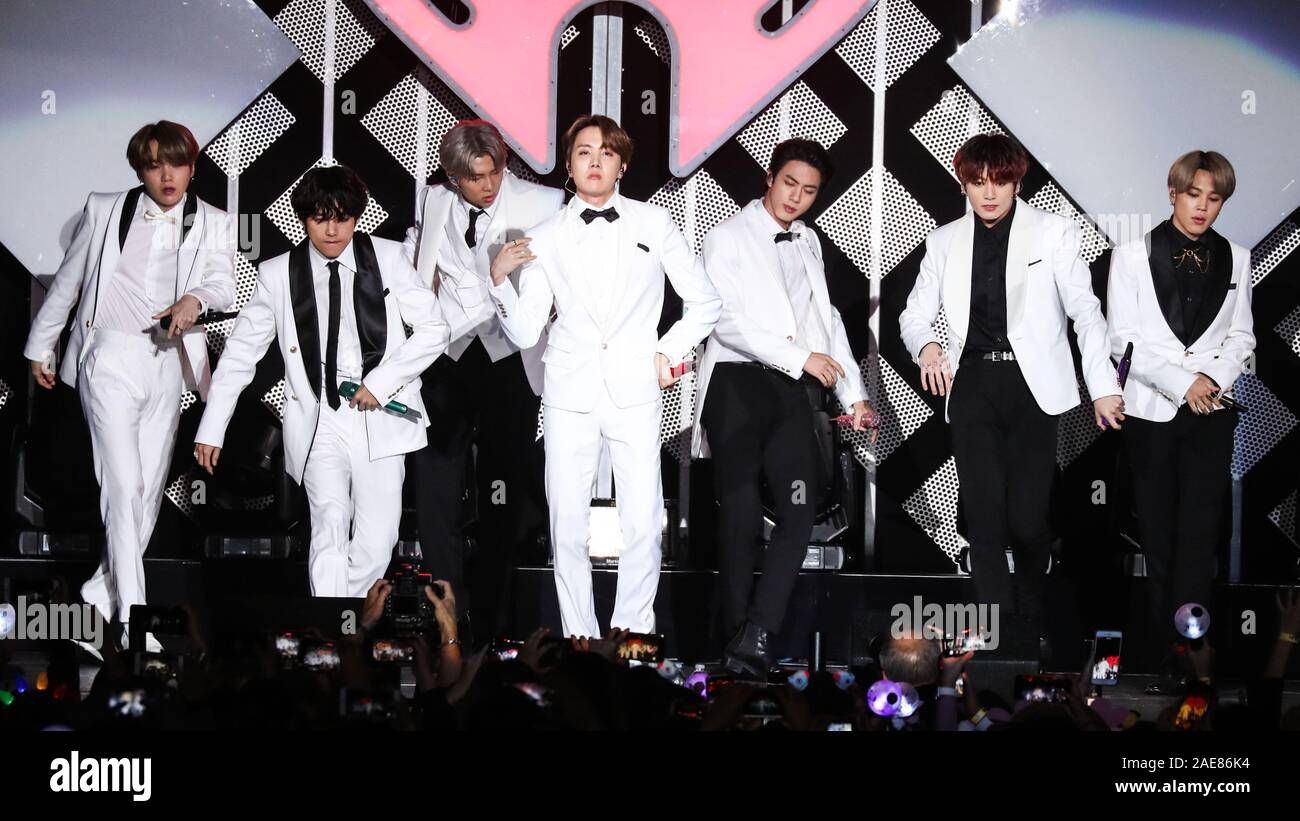 INGLEWOOD, LOS ANGELES, CALIFORNIA, USA - DECEMBER 06: J-Hope (Jung Ho-seok), Jimin (Park Ji-min), Jin (Kim Seok-jin), Jungkook (Jeon Jung-kook), RM (Kim Nam-joon), Suga (Min Yoon-gi), V (Kim Tae-hyung) of BTS perform at 102.7 KIIS FM's Jingle Ball 2019 held at The Forum on December 6, 2019 in Inglewood, Los Angeles, California, United States. (Photo by Xavier Collin/Image Press Agency) Stock Photo