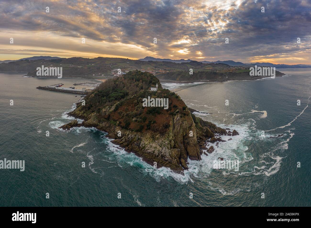 Getaria lighthouse at dusk, Basque country - drone aerial view Stock Photo