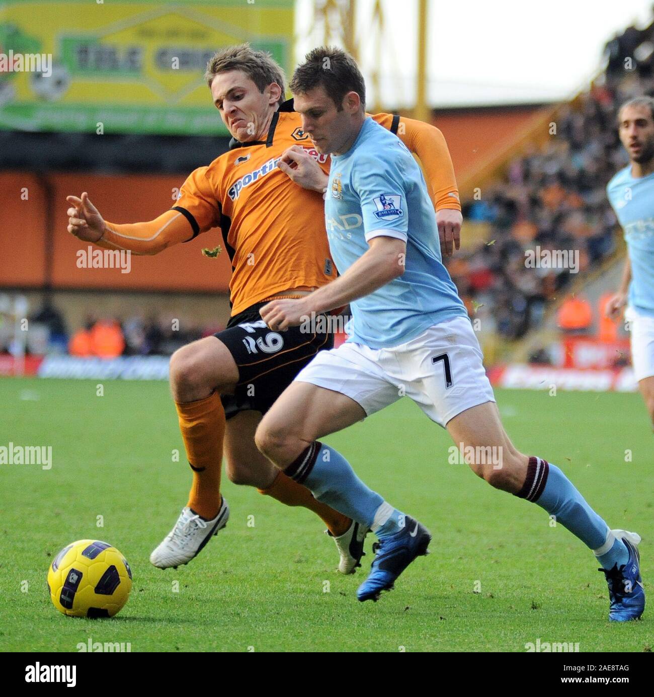 30th October 2010 - Premier League Football - Wolverhampton Wanderers Vs Manchester City - Kevin Doyle challenges James Milner. Photographer: Paul Roberts / OneUpTop/Alamy. Stock Photo