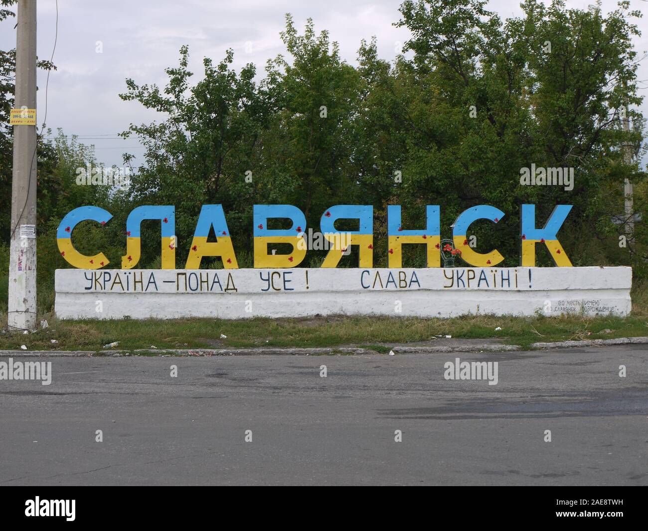 The monument at the entrance to the city of Sloviansk, in the east of Ukraine, was painted in the colors of the national flag Stock Photo