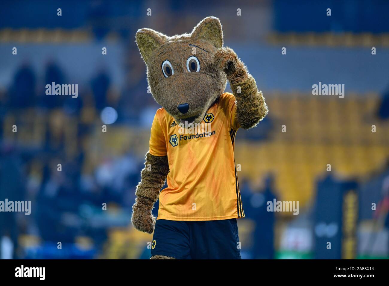 4th December 2019, Molineux, Wolverhampton, England; Premier League, Wolverhampton Wanderers v West Ham United : Wolves mascot waves to the crowd  Credit: Simon Whitehead/News Images Stock Photo