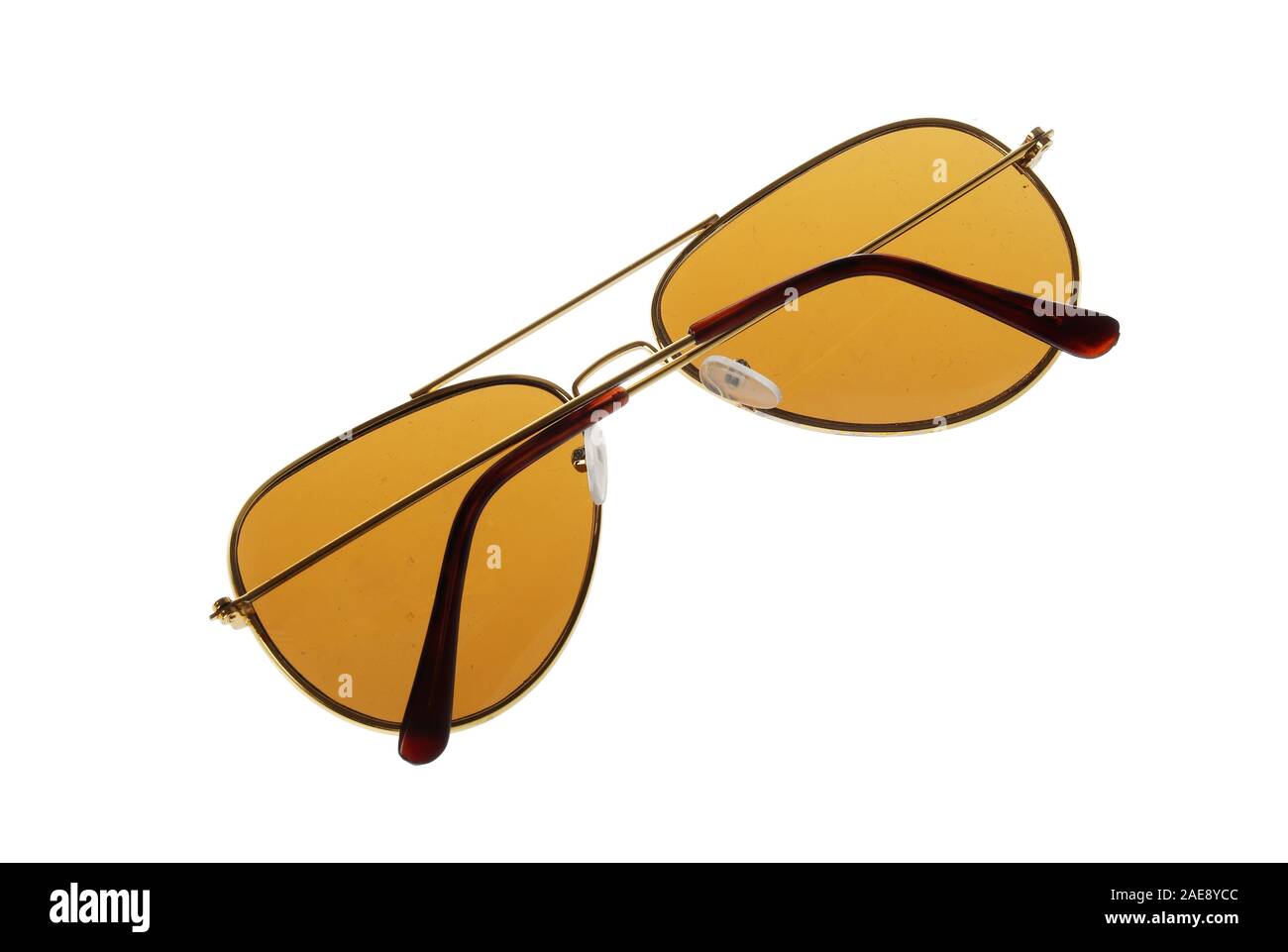 Rear view a pair of folded sunglasses isolated on white background