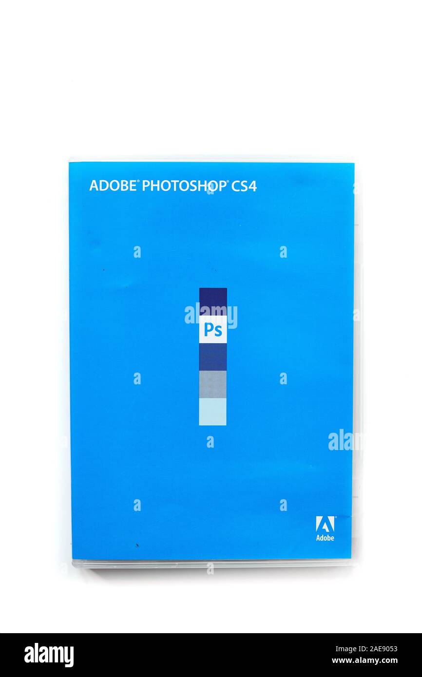 Hard folder containing the CD of Adobe Photoshop (Ps) CS4 software. Stock Photo
