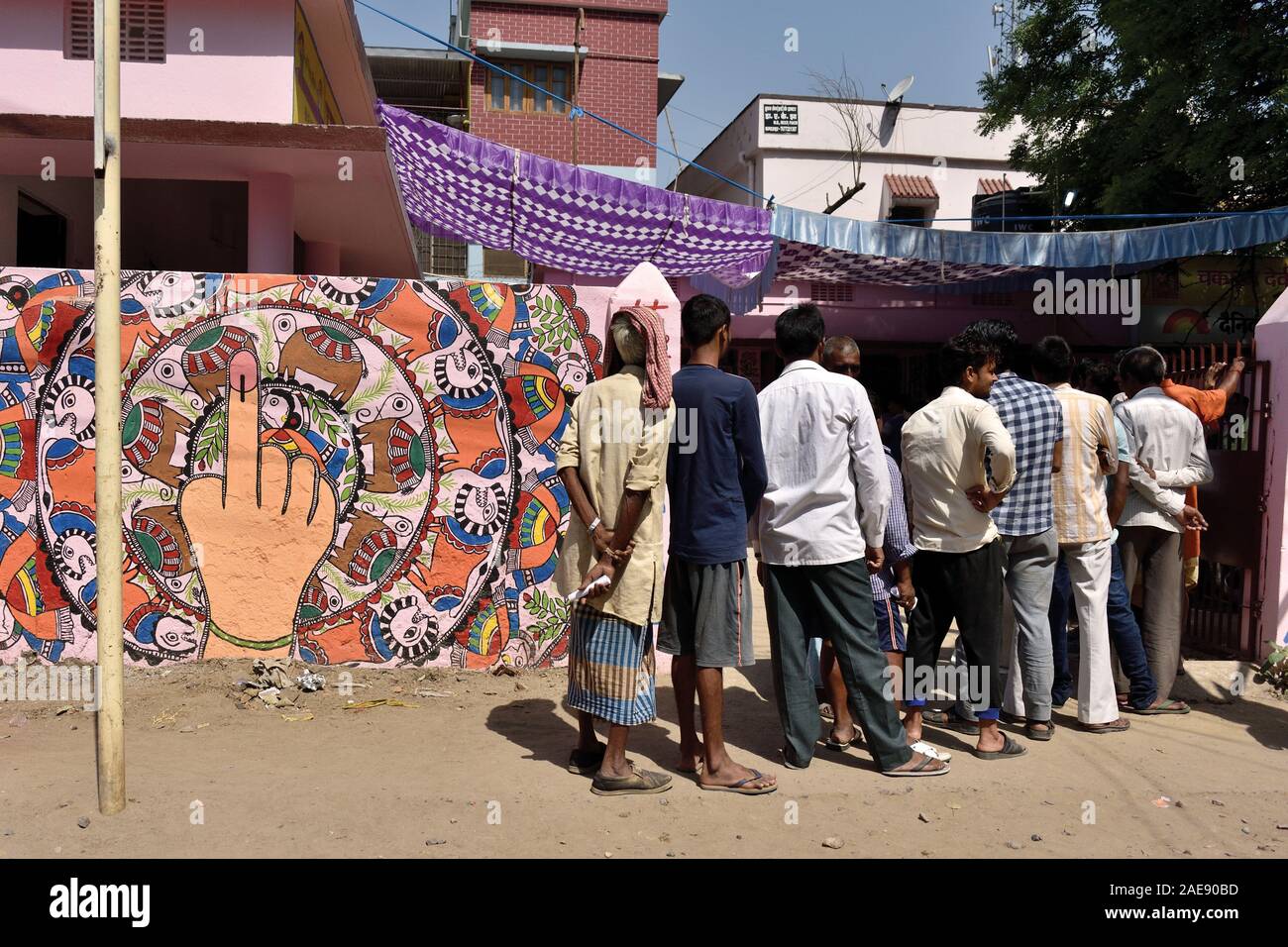 People waiting to cast their votes outside a polling station in Patna, India for the general elections held in May 2019. Stock Photo