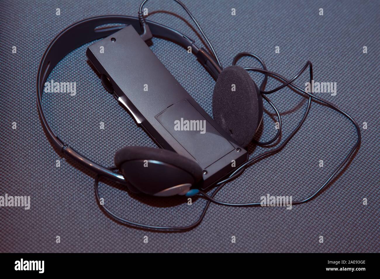 headphones used for simultaneous translation equipment simultaneous interpretation equipment . A set of headphones for simultaneous translation during Stock Photo