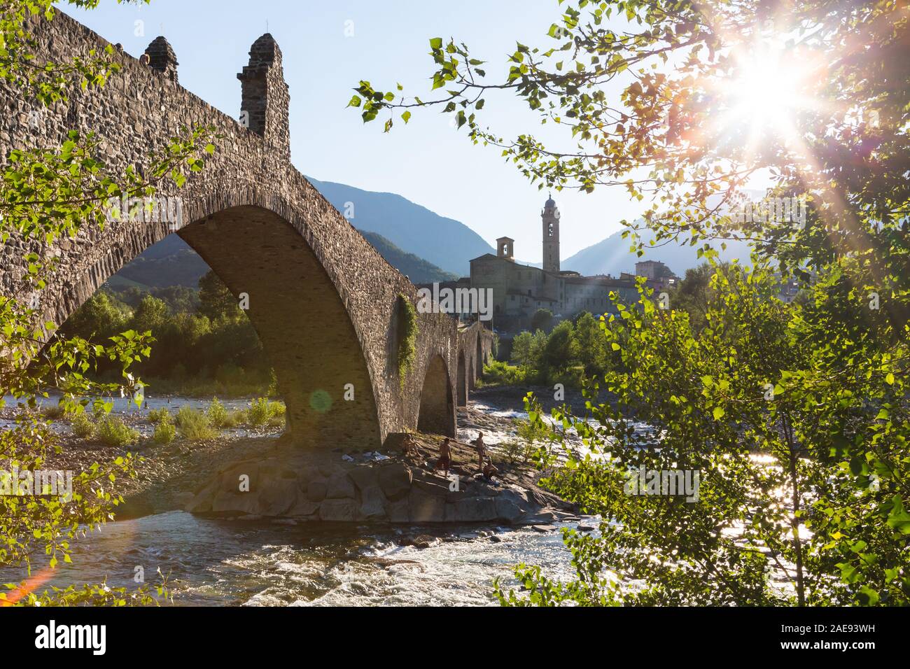 The old hunch-backed Bridge over the Trebbia river, Bobbio, Piacenza Province, Italy Stock Photo