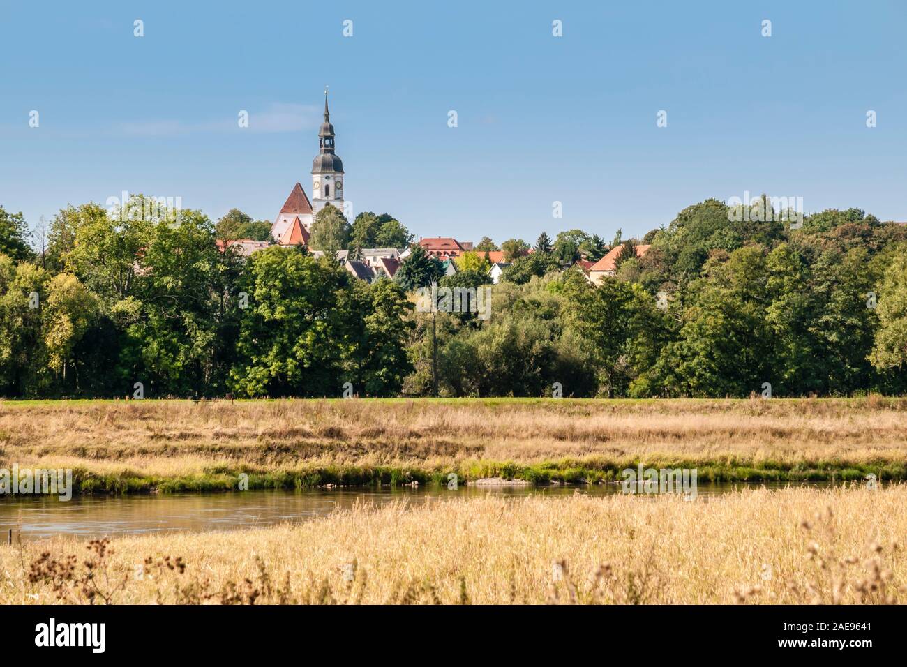 City of Strehla, church, banks of river Elbe, seen from Elbe cycle route on  eastside of river, Germany Stock Photo
