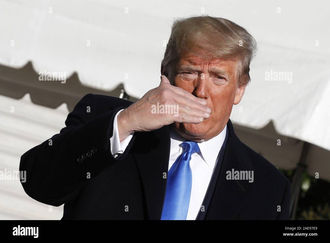 Washington, District of Columbia, USA. 7th Dec, 2019. U.S. President Donald Trump speaks to the media on the South Lawn of the White House in Washington before his departure to Fort Lauderdale, Florida on December 7, 2019. Trump is going to deliver remarks at the Republican Party of Florida Statesman's Dinner and the Israeli American Council National Summit. Credit: Yuri Gripas/Pool via CNP Credit: Yuri Gripas/CNP/ZUMA Wire/Alamy Live News Stock Photo