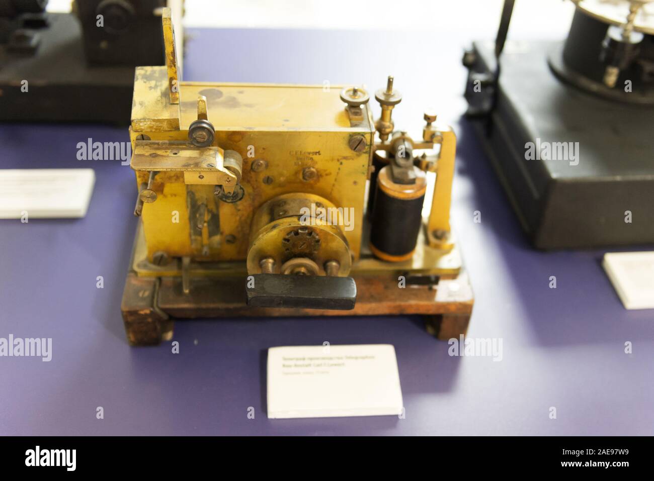 An old Telegraph machine. Brass information transmitter of the beginning of the last century. Stock Photo
