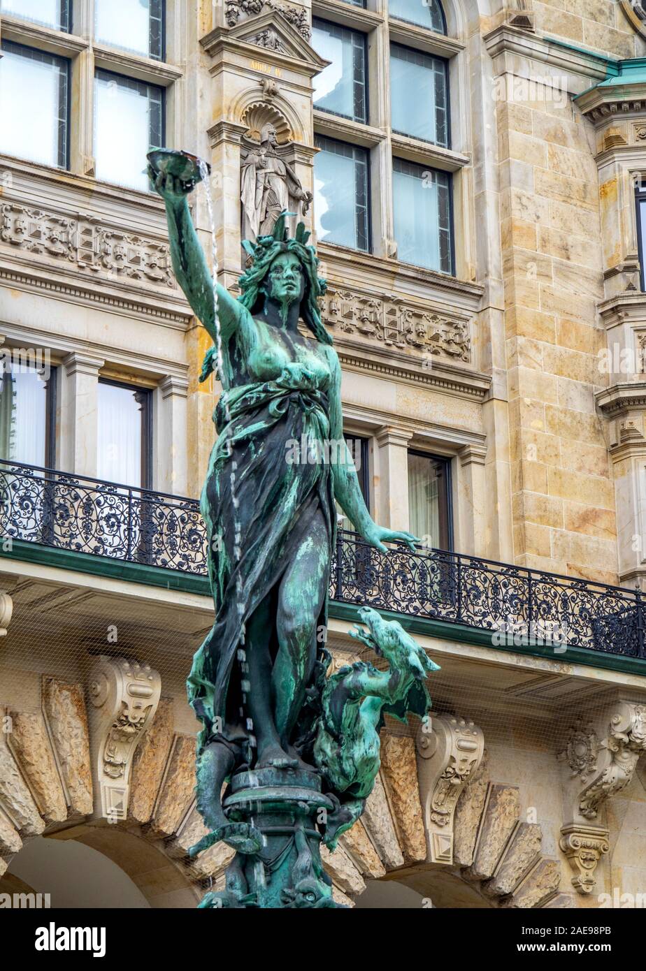 Bronze sculpture statue Hygieia fountain in the courtyard of Rathaus City Hall Hamburg Germany. Stock Photo
