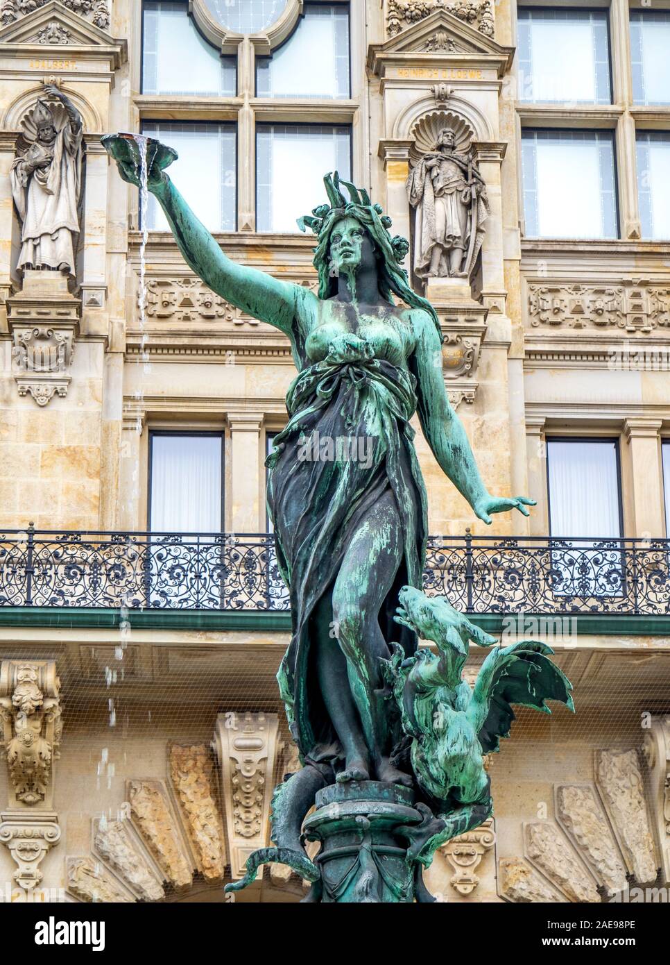 Bronze sculpture statue Hygieia fountain in the courtyard of Rathaus City Hall Hamburg Germany. Stock Photo
