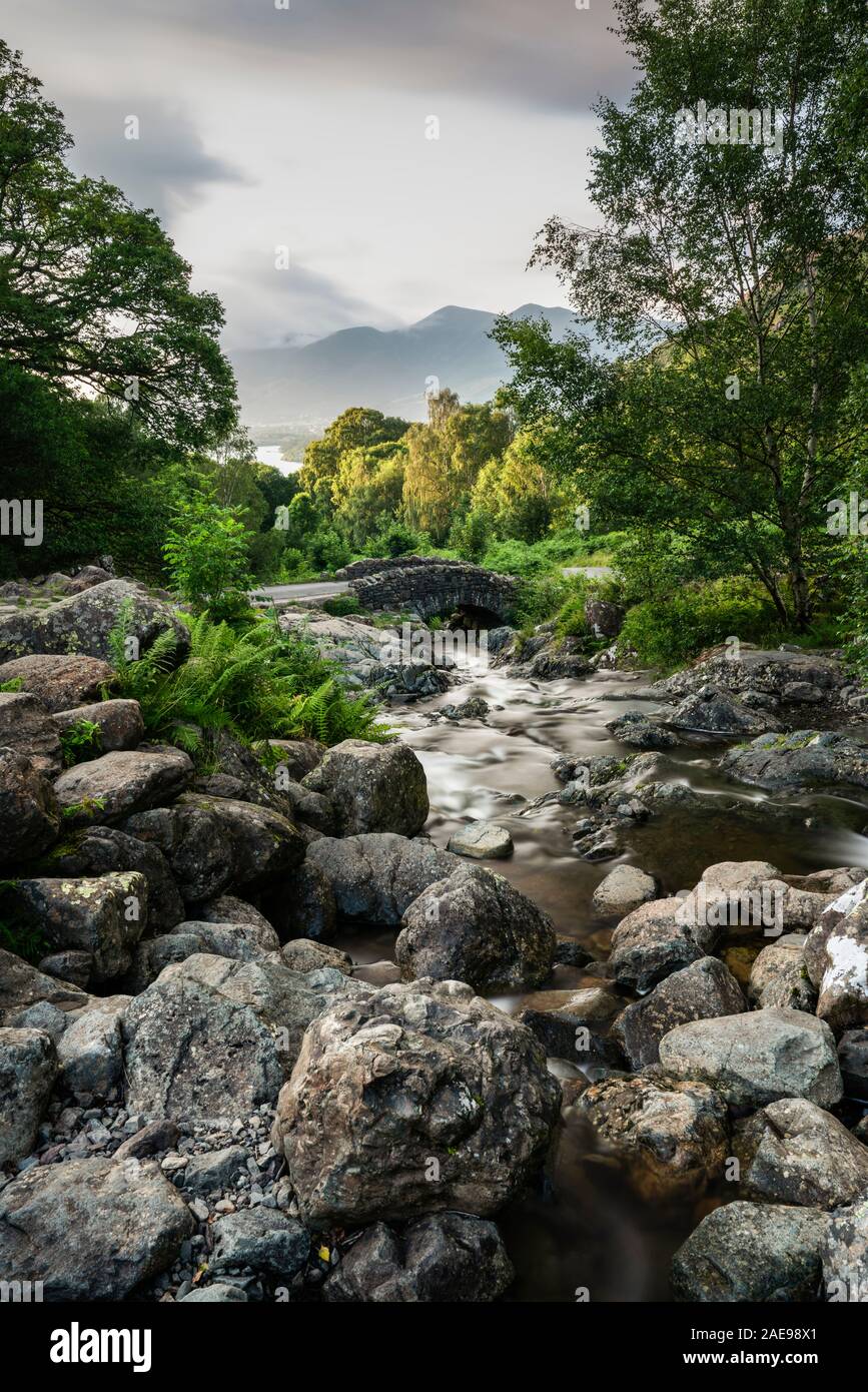 A late Summer evening  at Ashness Bridge with Skiddaw mountain in the background. Near Derwentwater, Lake District, Cumbria, England, UK Stock Photo