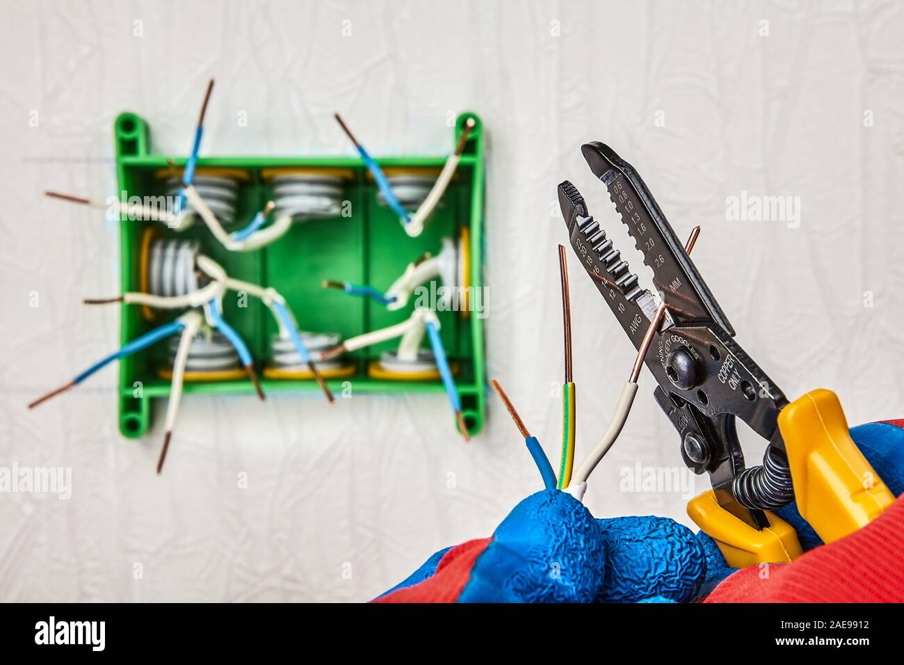 Ends of exposed copper wires protruding out junction box in the stage