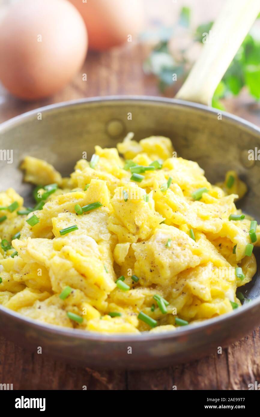 Plain Scrambled Eggs In A Copper Pan Stock Photo Alamy