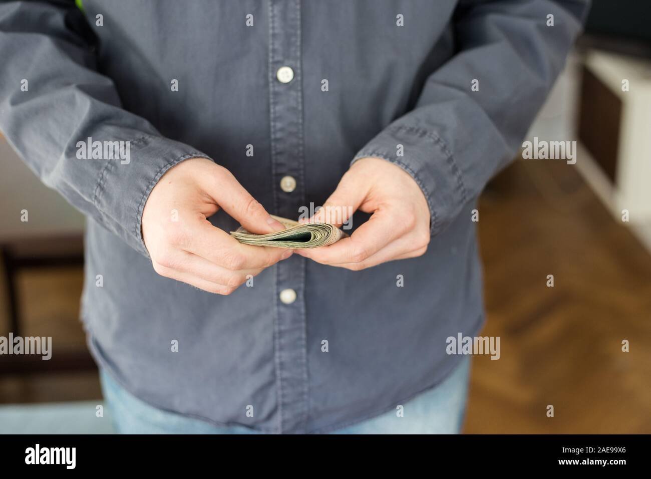 Unemployed man in home with last money Stock Photo