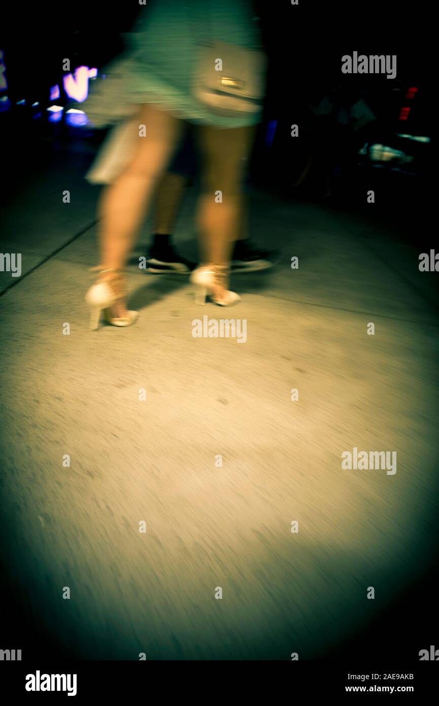 Woman back view dark street hi-res stock photography and images - Alamy