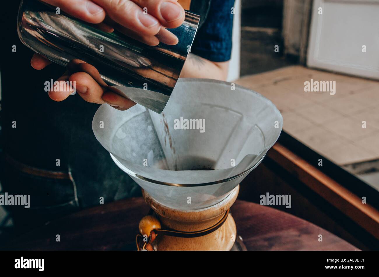 Hipster coffee pour hi-res stock 